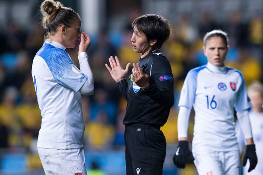 Referee Elvira Nurmustafina talk to Lucie Harsanyova of