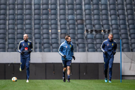 Marcus Danielson and goalkeeper Robin Olsen of the Swedish