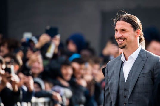 Zlatan Ibrahimovic heads for the revealing ceremony of his