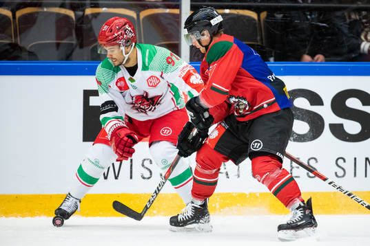 Ryan Lasch of Frölunda and Bryce Reddick of Cardiff