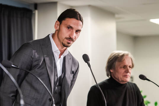 Zlatan Ibrahimovic and Peter Linde, artist, at a press