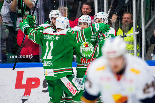 Rögles spelare jublar