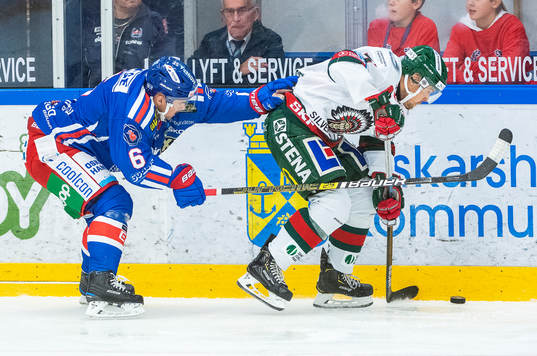 Oskarshamns Jesper Dahlroth och Frölundas Mats Rosseli