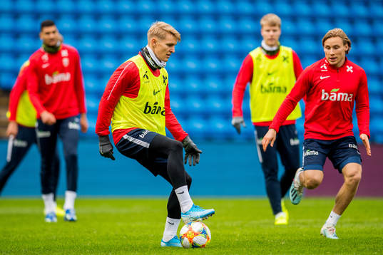 Martin Ødegaard and Jonas Svensson of Norway