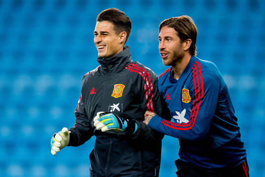 Goalkeeper Kepa Arrizabalaga and Sergio Ramos of Spain