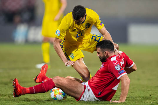 Robin Quaison of Sweden and Zach Muscat of Malta