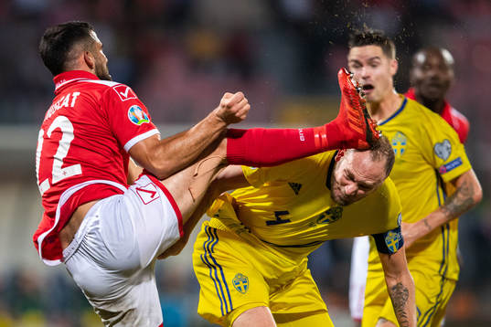 Zach Muscat of Malta and Andreas Granqvist of Sweden