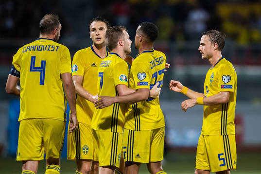 Sebastian Larsson of Sweden celebrate with teammates