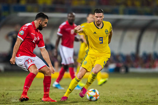 Zach Muscat of Malta and Marcus Berg of Sweden
