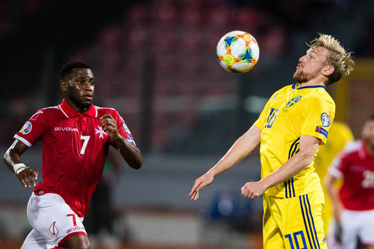 Joseph Mbong of Malta and Emil Forsberg of Sweden