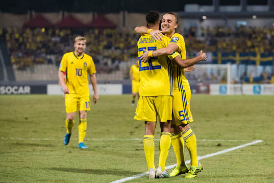 Robin Quaison and Pierre Bengtsson of Sweden celebrates