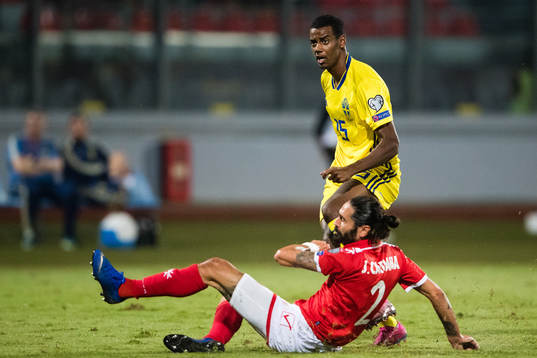 Alexander Isak of Sweden and Jonathan Caruana of Malta
