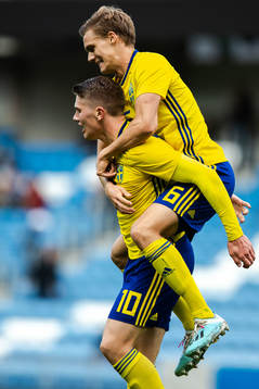Viktor Gyökeres and Svante Ingelsson of Sweden celebrate