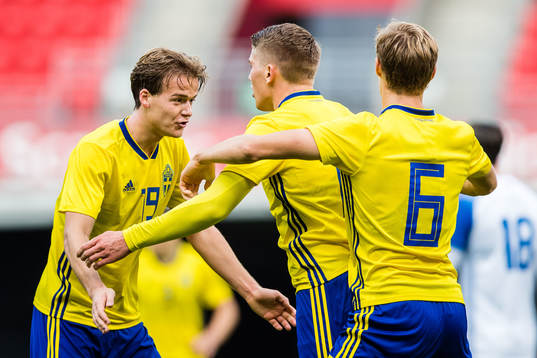 August Erlingmark of Sweden celebrates with teammates