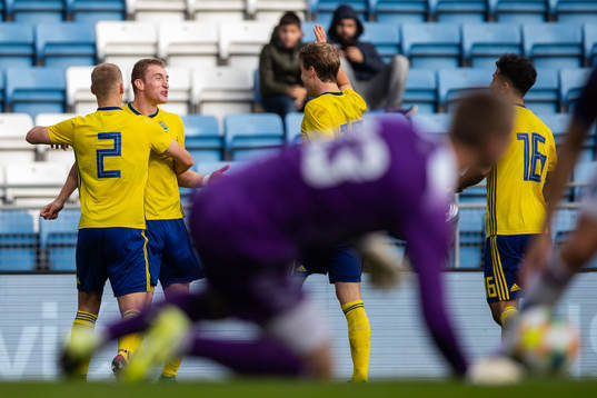 Dejan Kulusevski of Sweden celebrate with teammates