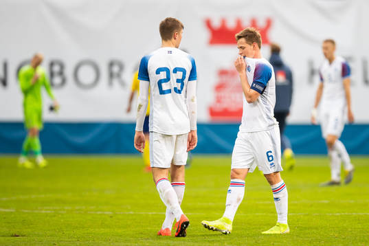 Ari Leifsson and Alex Hauksson of Iceland look dejected