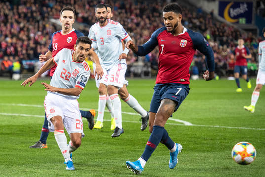 Jesus Navas of Spain and Joshua King of Norway