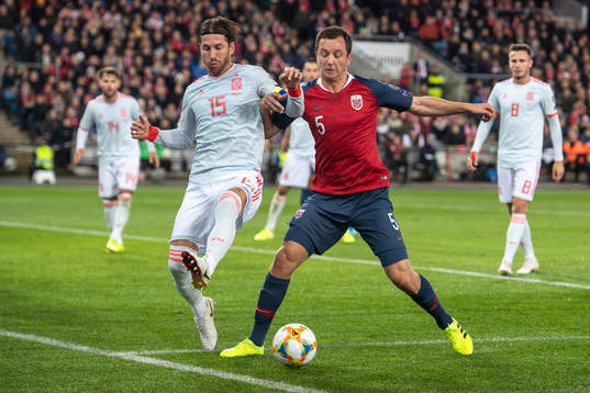 Sergio Ramos of Spain and Even Hovland of Norway