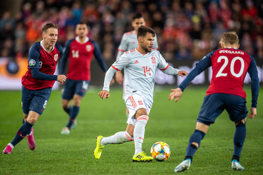 Juan Bernat of Spain and Martin Ødegaard of Norway