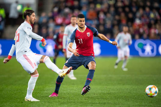Sergio Ramos of Spain and Bjørn Maars Johnsen of Norway