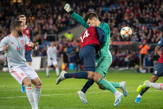 Omar Elabdellaoui of Norway collides with goalkeeper Kepa