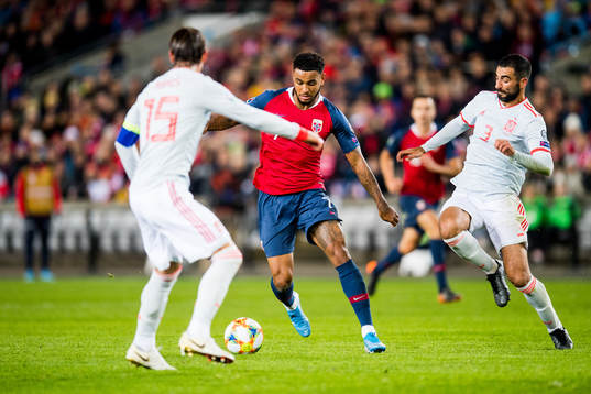 Joshua King of Norway and Raul Albiol of Spain