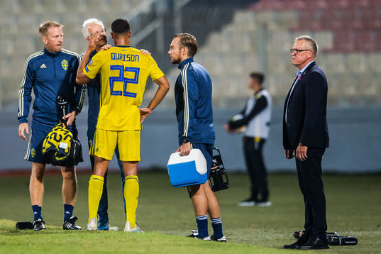 Robin Quaison of Sweden receives medical treatment