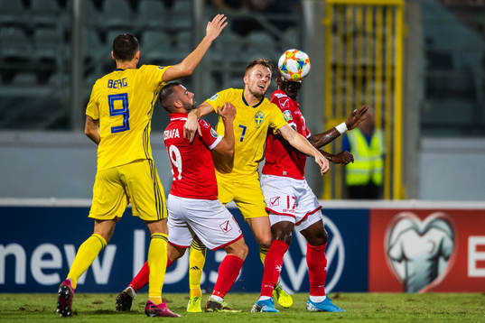 Sebastian Larsson and Marcus Berg of Sweden against Joseph