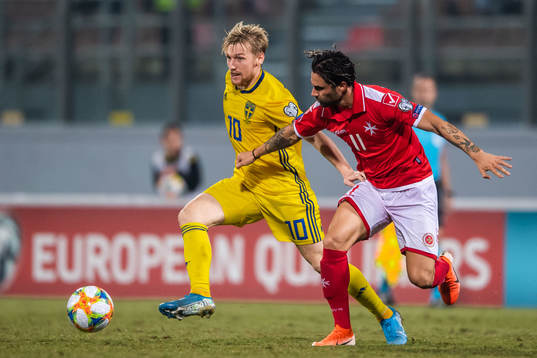 Emil Forsberg of Sweden and Rowen Muscat of Malta