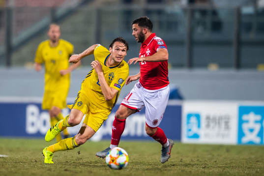 Albin Ekdal of Sweden and Luke Gambin of Malta