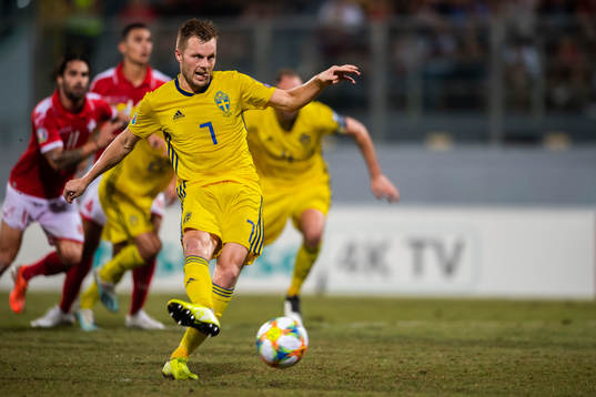 Sebastian Larsson of Sweden scores 0-2