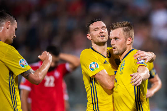 Mikael Lustig, Marcus Berg and Sebastian Larsson of Sweden