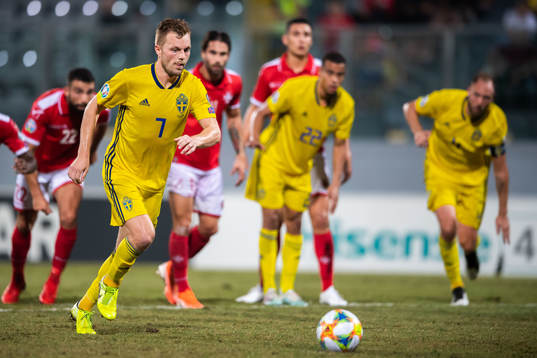 Sebastian Larsson of Sweden scores 0-2