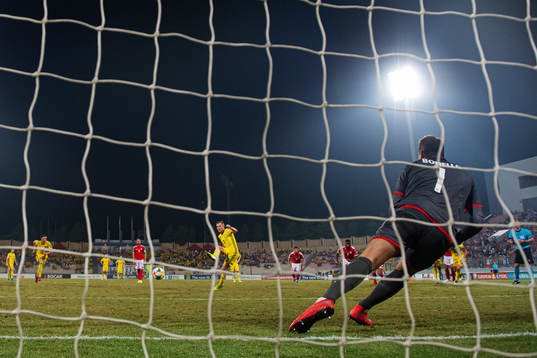 Sebastian Larsson of Sweden scores 0-2