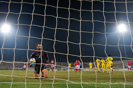 Goalkeeper Henry Bonello of Malta looks dejected