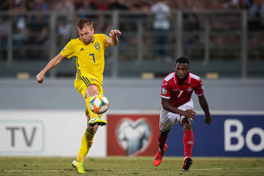 Sebastian Larsson of Sweden and Joseph Mbong of Malta