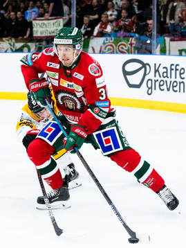Luleås Erik Gustafsson och Frölundas Nicklas Lasu