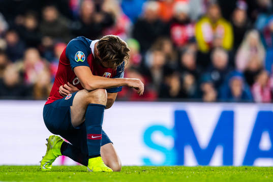 Håvard Nordtveit of Norway in pain