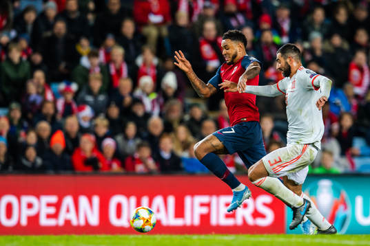 Joshua King of Norway and Raul Albiol of Spain