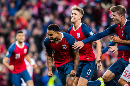 Joshua King of Norway celebrate with teammates