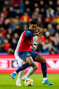 Joshua King of Norway and Sergio Ramos of Spain