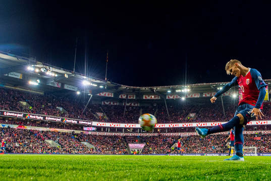 Martin Ødegaard of Norway takes a corner kick