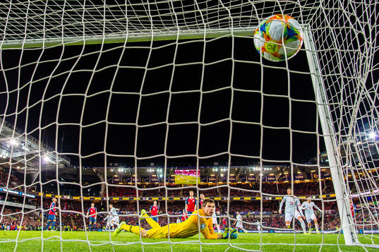 Saul Niguez of Spain scores the 0-1 goal behind goalkeeper