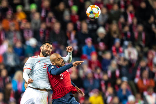 Raul Albiol of Spain and Haitam Aleesami of Norway