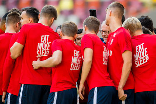 Lars Lagerbäck, head coach of Norway, gathers the team in