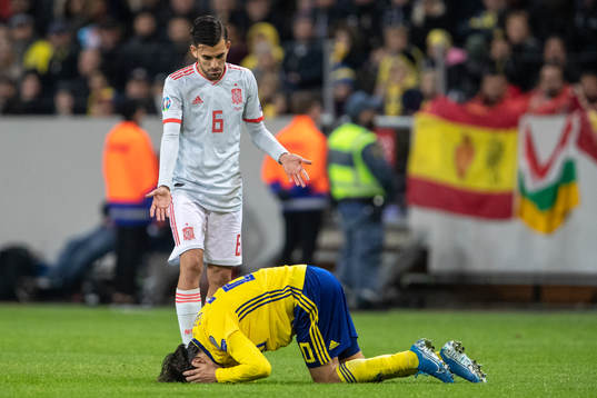 Dani Ceballos of Spain reacts to Kristoffer Olsson of
