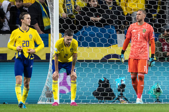 Kristoffer Olsson, Mikael Lustig and goalkeeper Robin Olsen