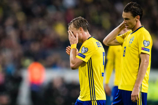 Pierre Bengtsson and Albin Ekdal of Sweden looks dejected