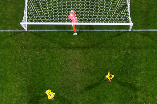 Goalkeeper Robin Olsen of Sweden takes the ball out of goal
