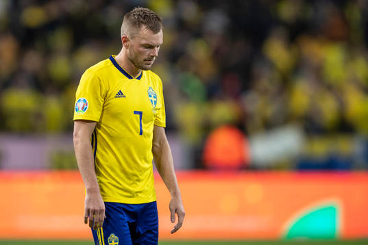 Sebastian Larsson of Sweden looks dejected
